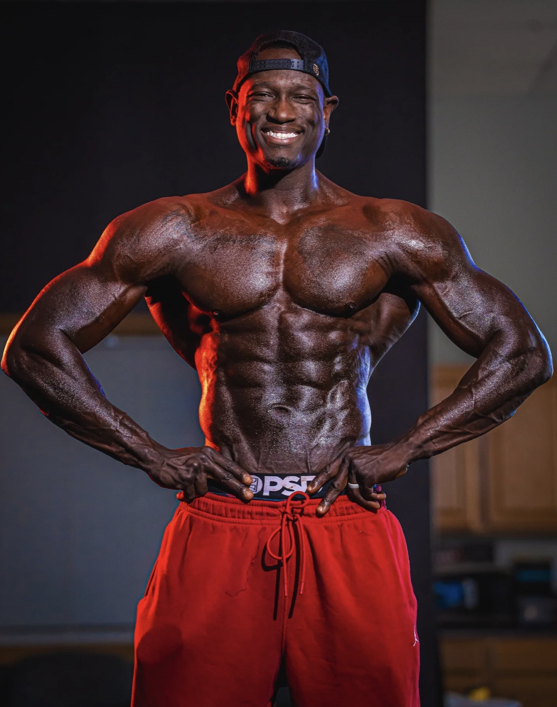 Coach JR smiling in a front pose